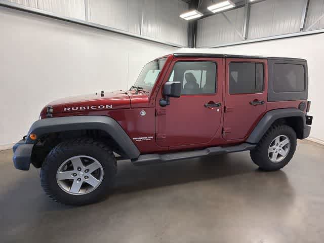Used 2012 Jeep Wrangler Unlimited Rubicon w/ Dual Top Group AWD/4WD image 2