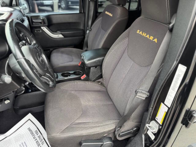 Used 2014 Jeep Wrangler Unlimited Sahara w/ Dual Top Group AWD/4WD image 13