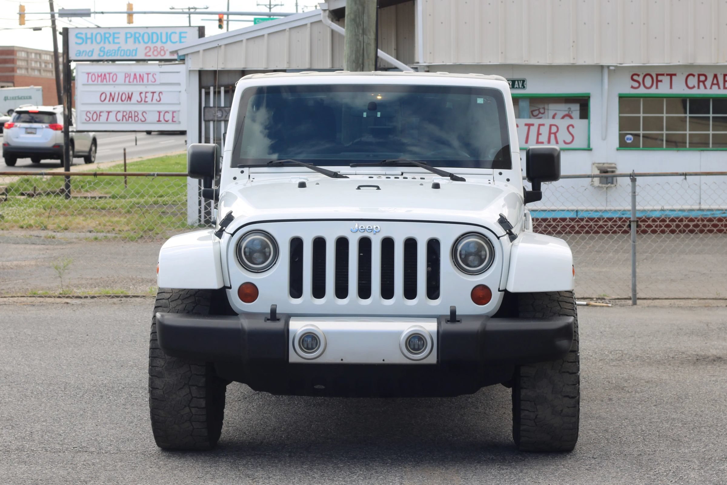 Used 2012 Jeep Wrangler Unlimited Sahara w/ Dual Top Group AWD/4WD image 2