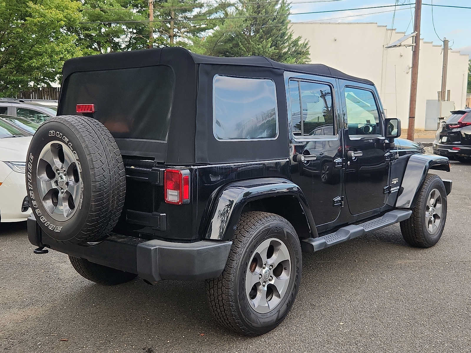 Used 2016 Jeep Wrangler Unlimited Sahara w/ Dual Top Group AWD/4WD image 6