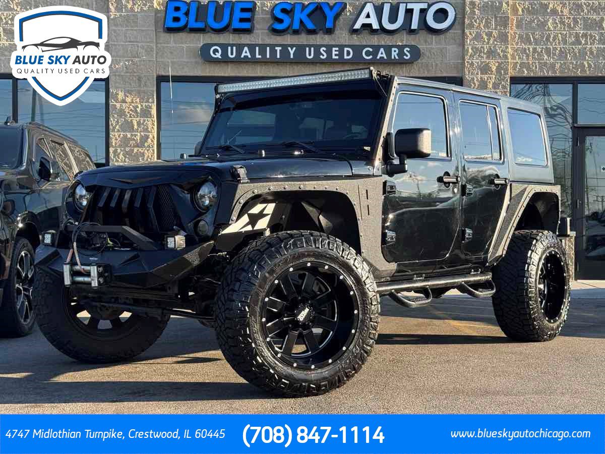 Used 2013 Jeep Wrangler Unlimited Sport AWD/4WD image 1