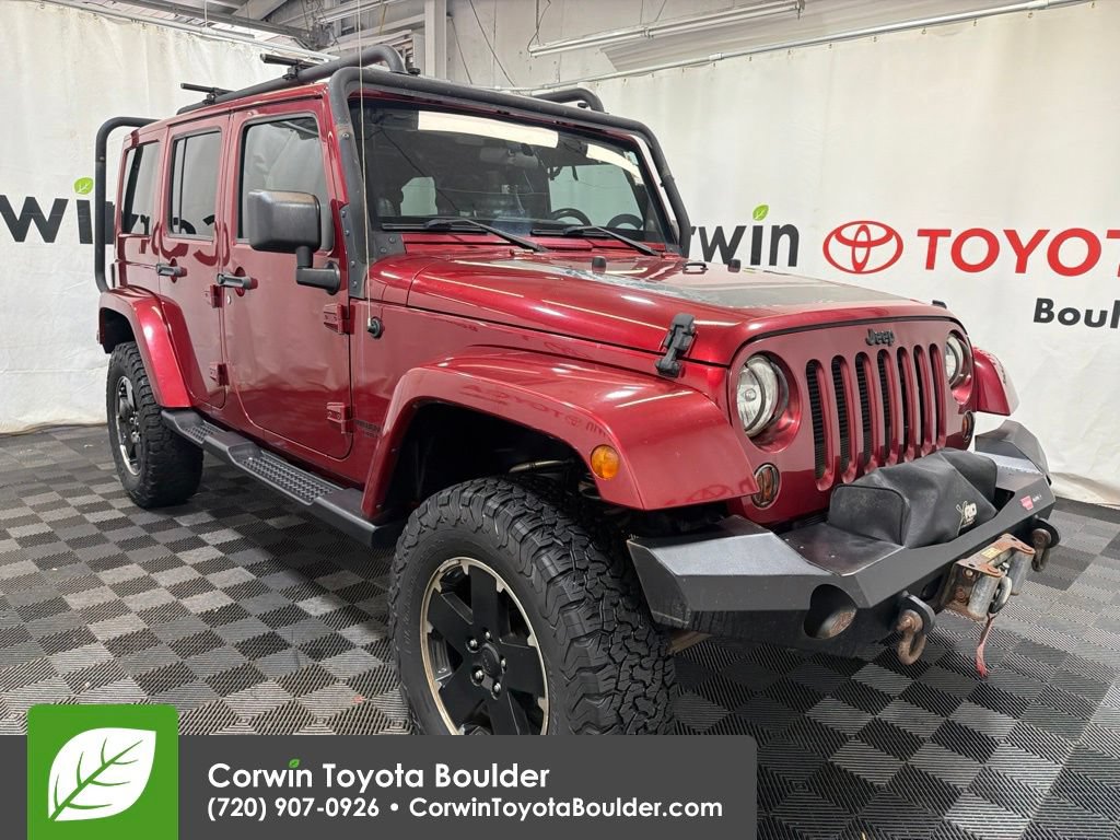 Used 2012 Jeep Wrangler Unlimited Sahara AWD/4WD image 1