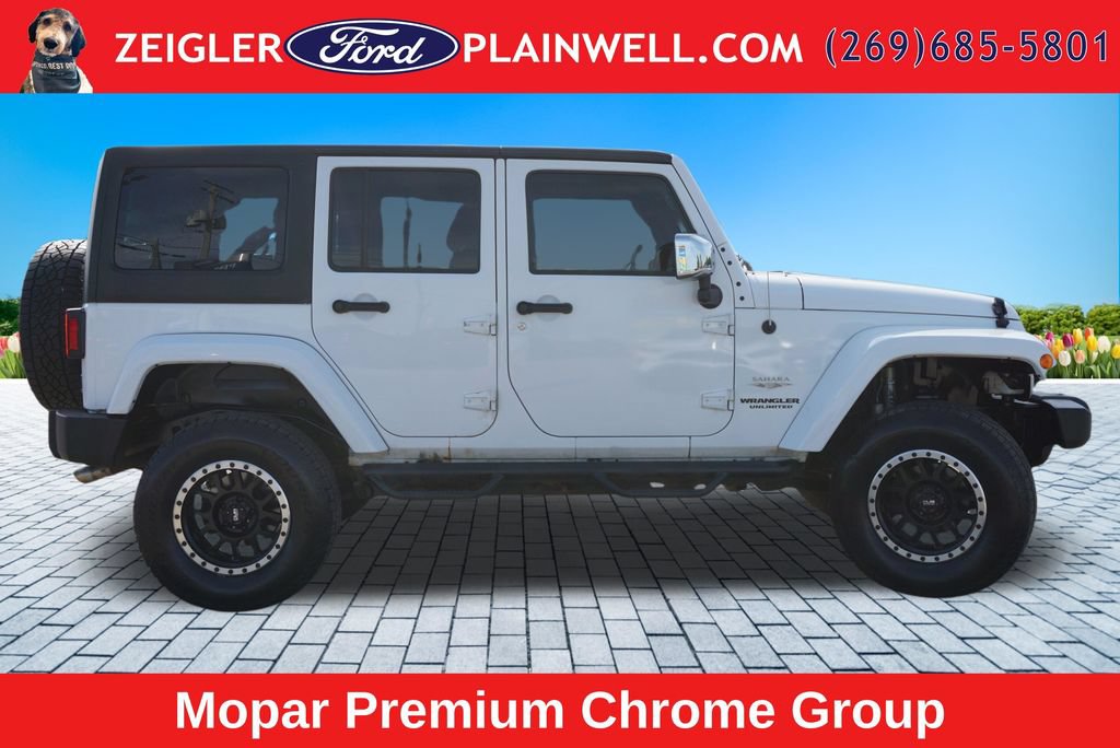 Used 2012 Jeep Wrangler Unlimited Sahara w/ Dual Top Group AWD/4WD image 6