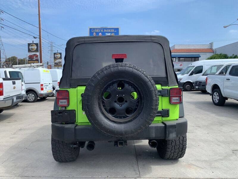 Used 2013 Jeep Wrangler Unlimited Sport w/ Mopar Black Appearance Group image 6