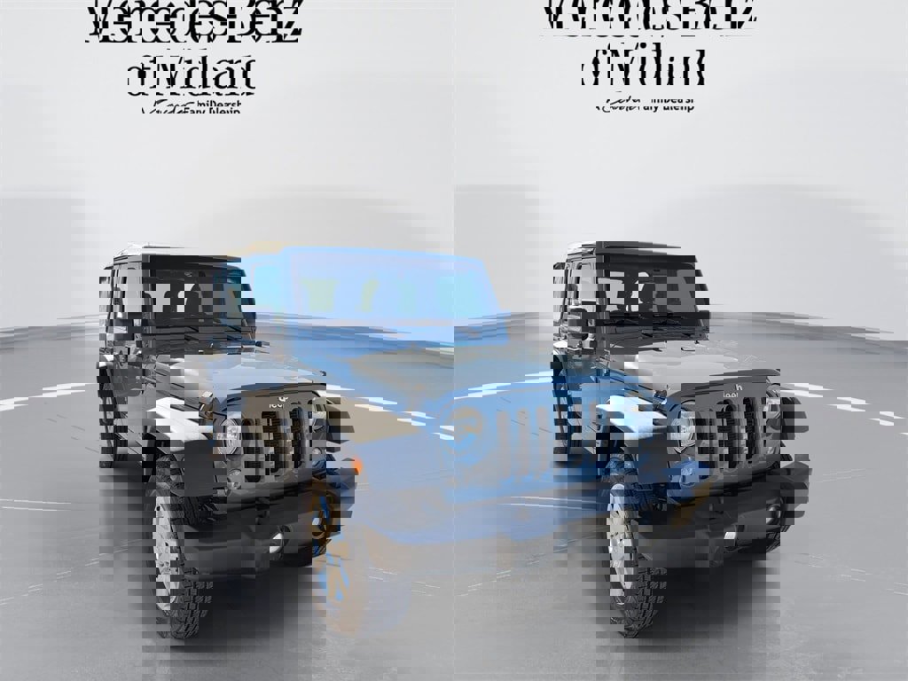 Used 2015 Jeep Wrangler Unlimited Sport image 1