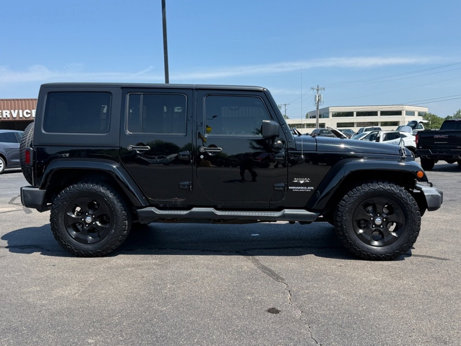 Used 2016 Jeep Wrangler Unlimited Sahara w/ Dual Top Group AWD/4WD image 9
