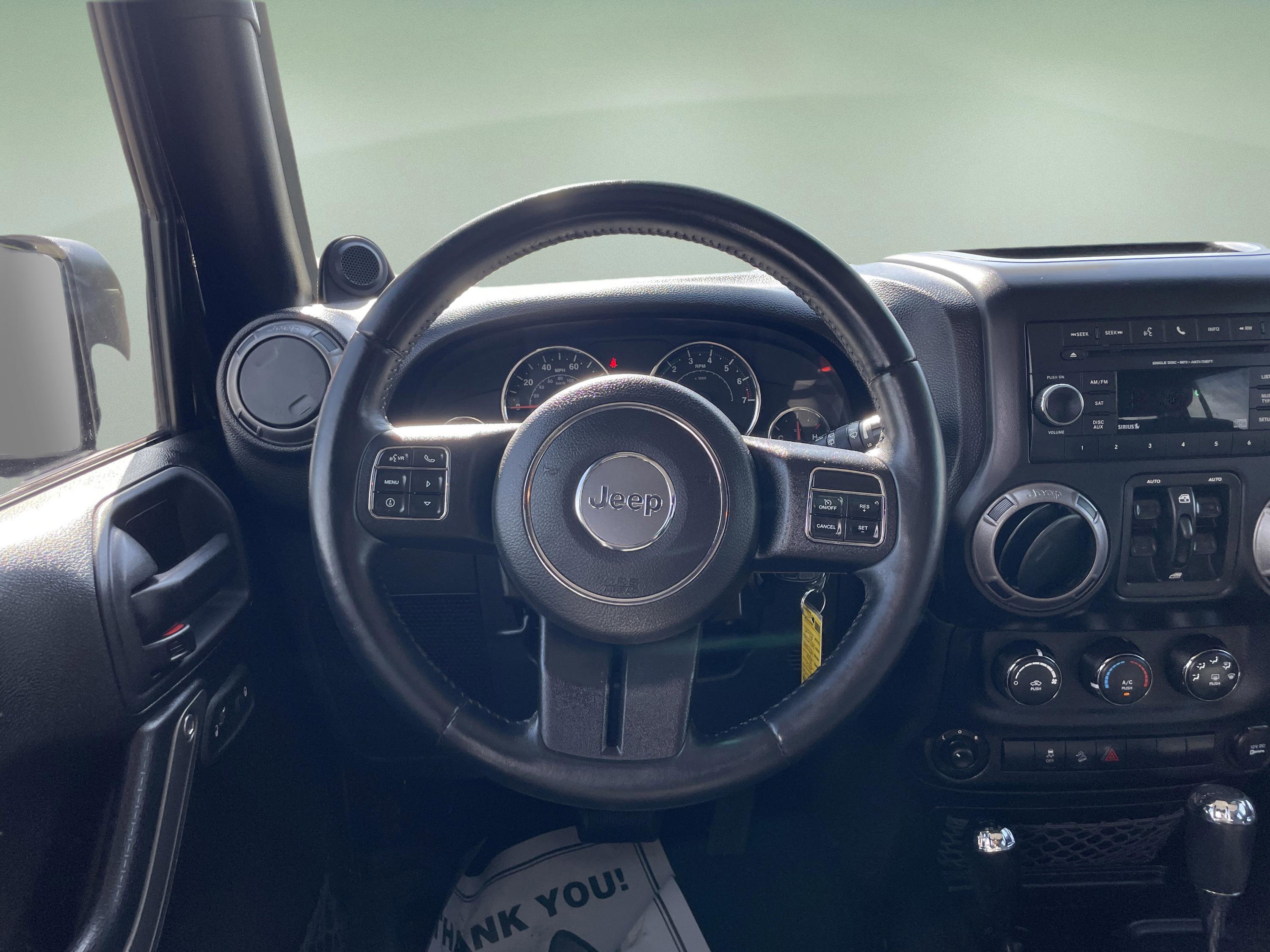 Used 2012 Jeep Wrangler Unlimited Sport AWD/4WD image 10