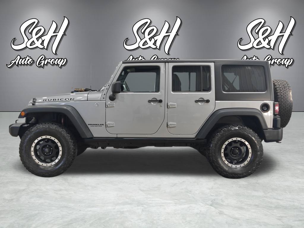 Used 2013 Jeep Wrangler Unlimited Rubicon w/ Dual Top Group AWD/4WD image 16
