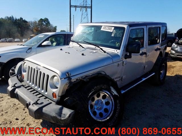Used 2011 Jeep Wrangler Unlimited Sport image 1