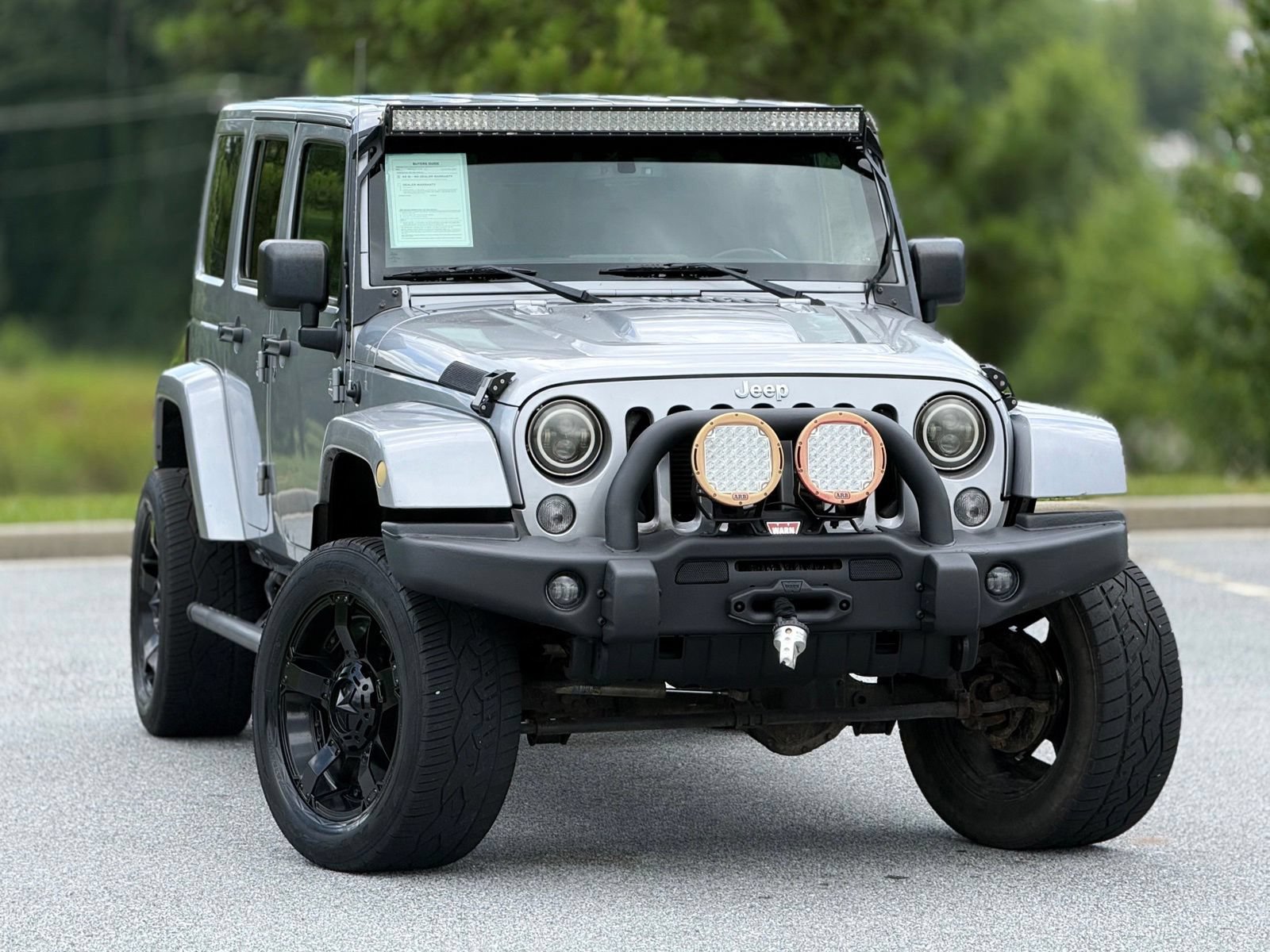 Used 2014 Jeep Wrangler Unlimited Rubicon w/ Dual Top Group AWD/4WD image 4
