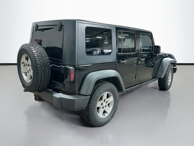 Used 2010 Jeep Wrangler Unlimited Rubicon w/ Dual Top Group image 6