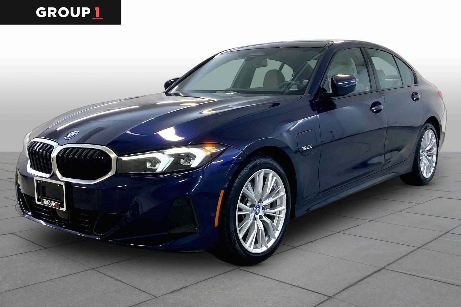 Certified 2023 BMW 330e xDrive w/ Premium Package AWD/4WD image 1