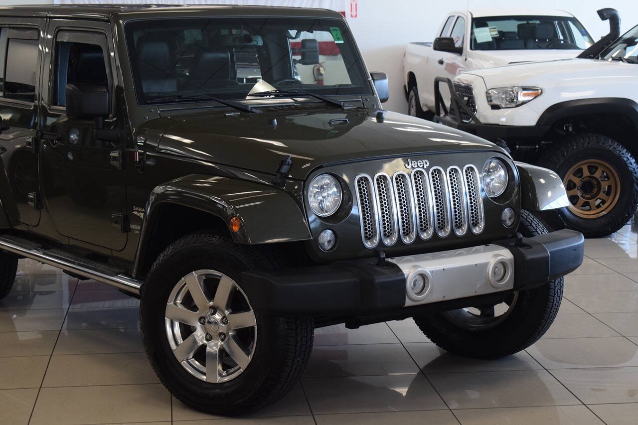 Used 2015 Jeep Wrangler Unlimited Sahara w/ Dual Top Group AWD/4WD image 9
