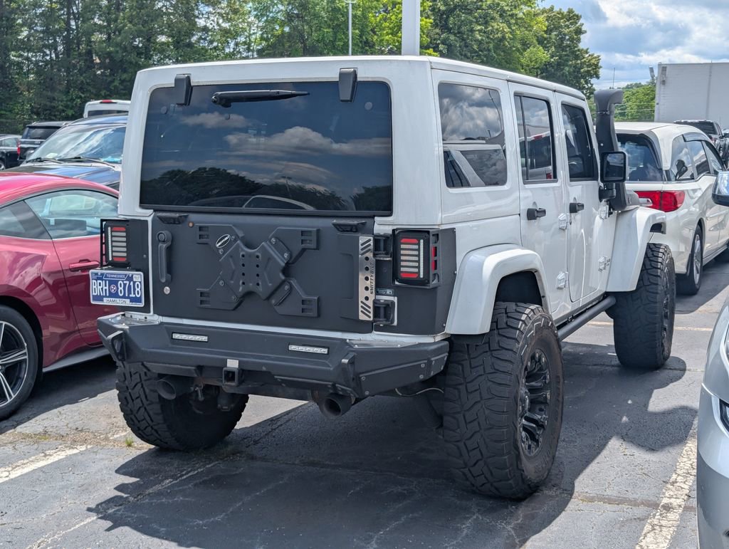 Used 2014 Jeep Wrangler Unlimited Rubicon w/ Dual Top Group AWD/4WD image 3