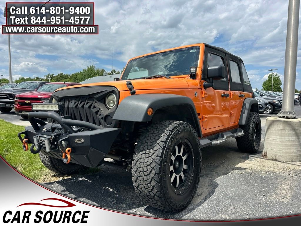 Used 2012 Jeep Wrangler Unlimited Sport w/ Connectivity Group AWD/4WD image 1