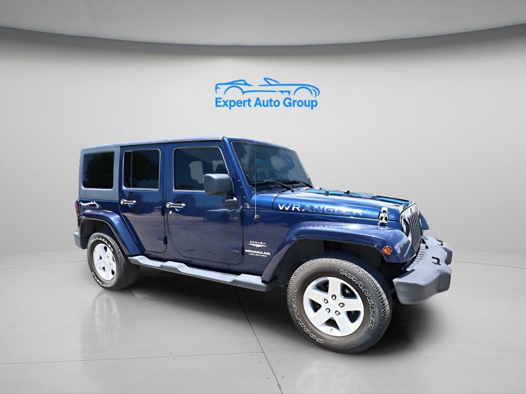 Used 2013 Jeep Wrangler Unlimited Sahara w/ Connectivity Group AWD/4WD image 1