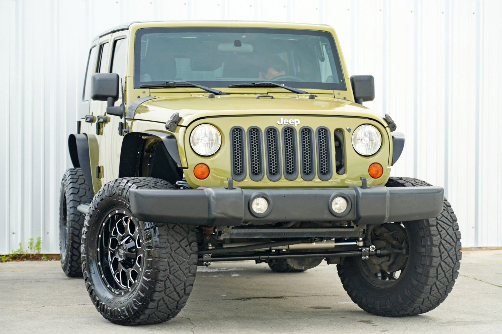 Used 2013 Jeep Wrangler Unlimited Sport w/ Mopar Black Appearance Group image 2