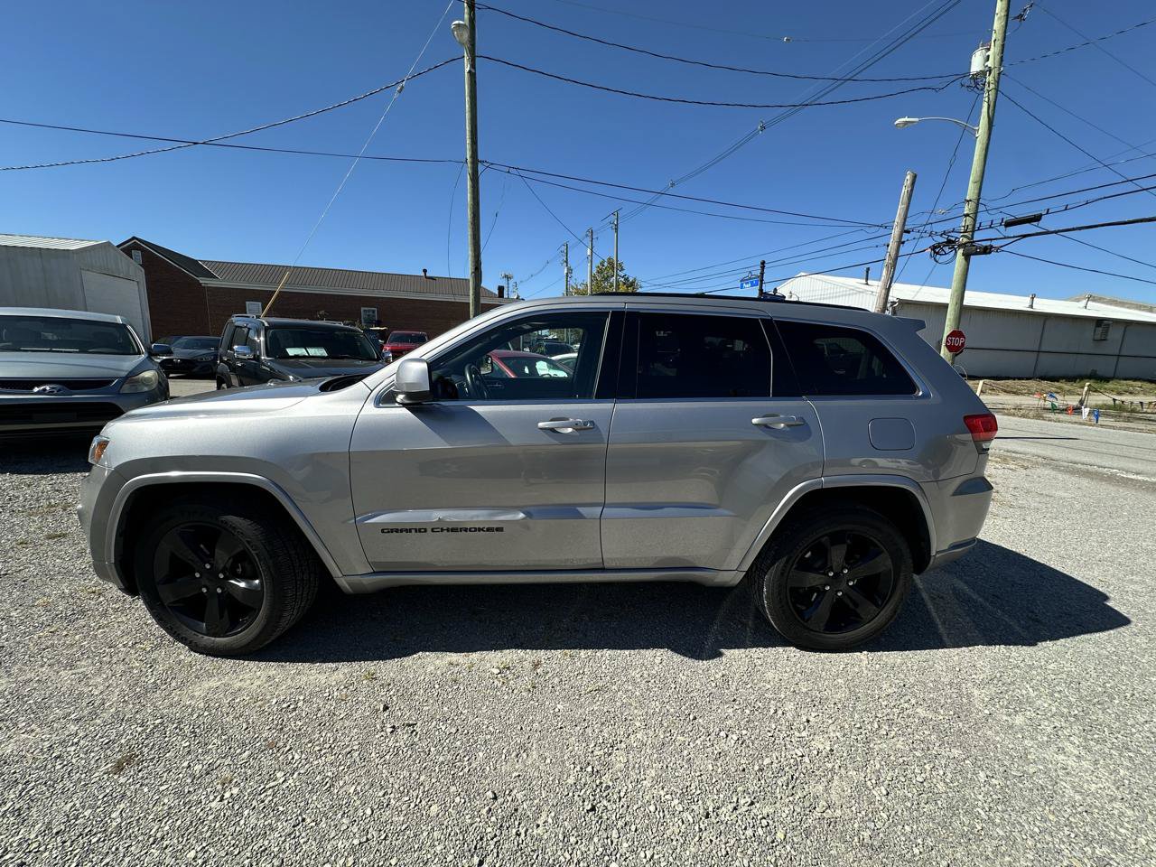 Used 2015 Jeep Grand Cherokee Altitude AWD/4WD image 3