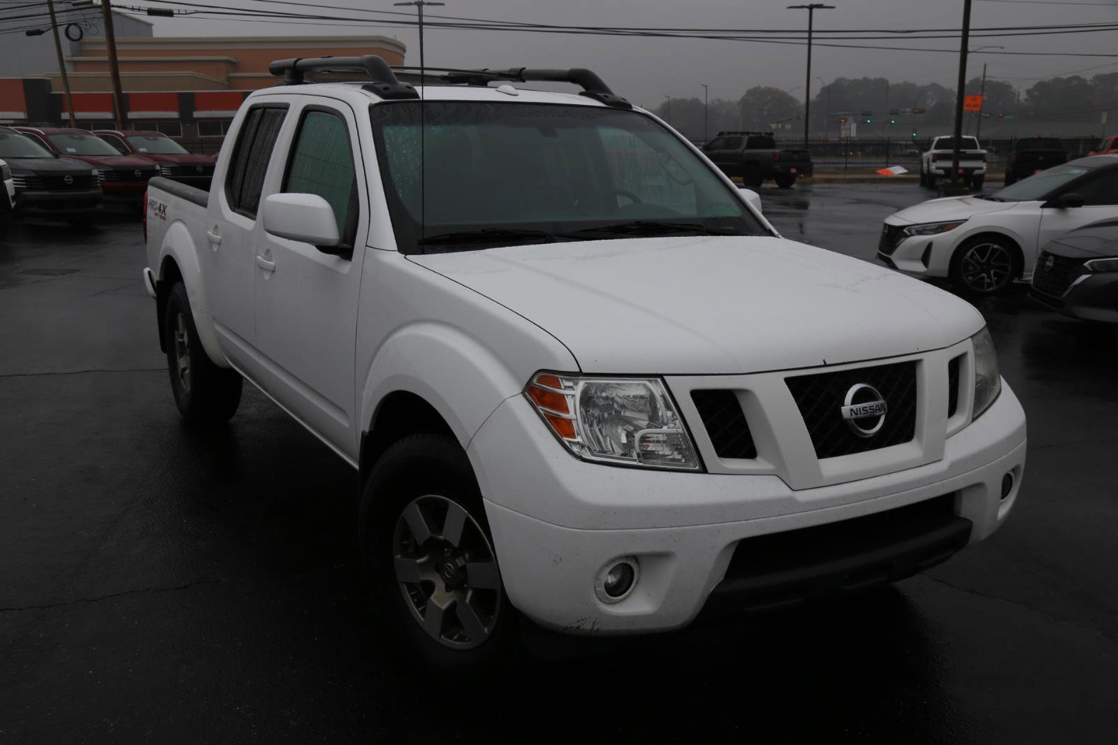 Used 2012 Nissan Frontier PRO-4X w/ Pro-4x Luxury Pkg image 1