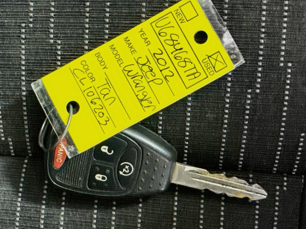 Used 2012 Jeep Wrangler Unlimited Sahara w/ Dual Top Group AWD/4WD image 32
