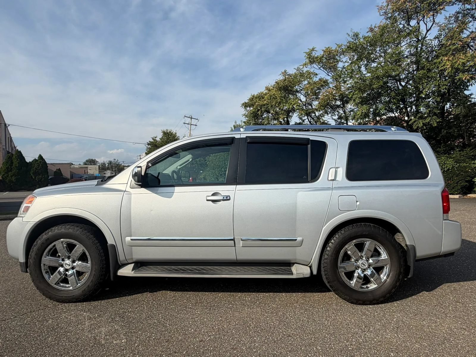 Used 2011 Nissan Armada Platinum w/ 2nd Row Captain Seat Pkg AWD/4WD image 4