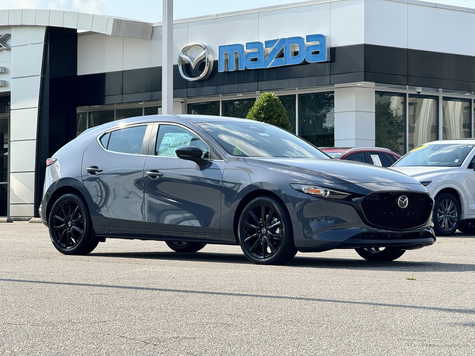 New 2025 MAZDA MAZDA3 Carbon image 1