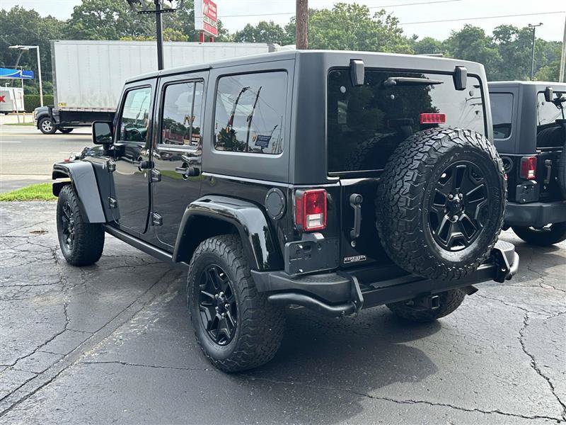 Used 2016 Jeep Wrangler Unlimited Sahara AWD/4WD image 3