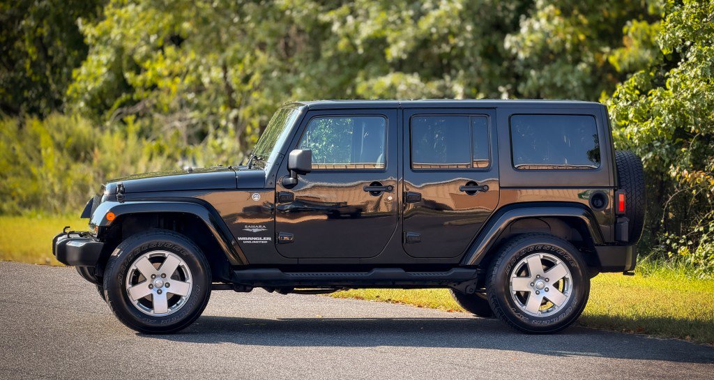 Used 2011 Jeep Wrangler Unlimited Sahara w/ Dual Top Group image 4
