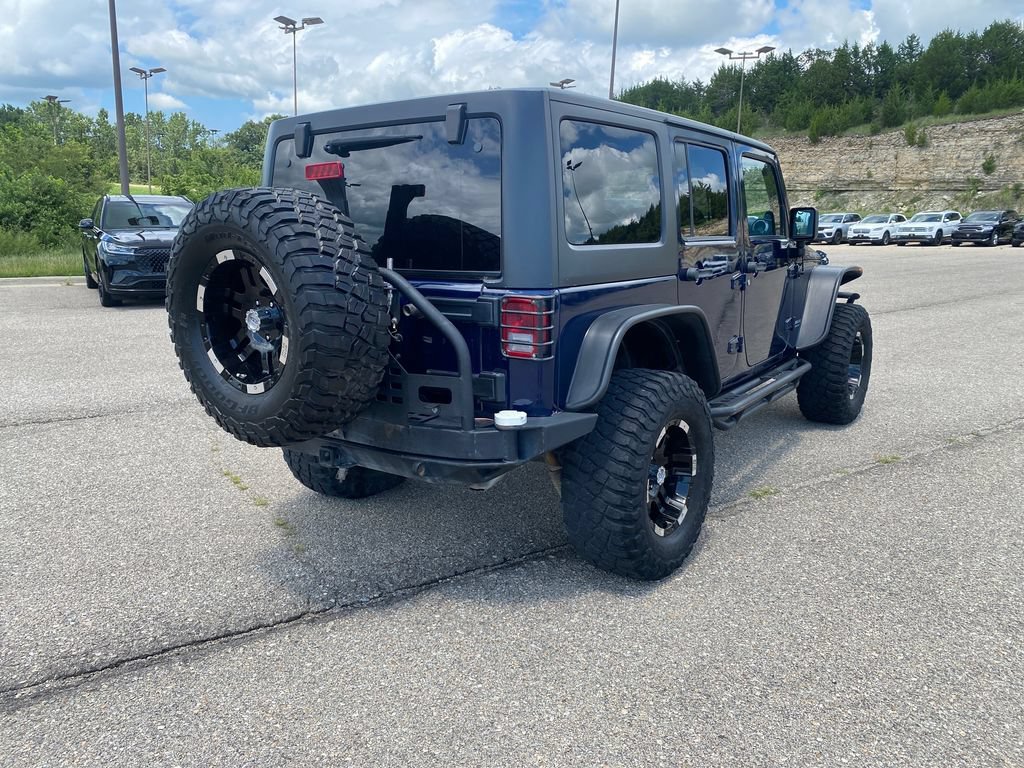 Used 2013 Jeep Wrangler Unlimited Rubicon w/ Dual Top Group AWD/4WD image 4