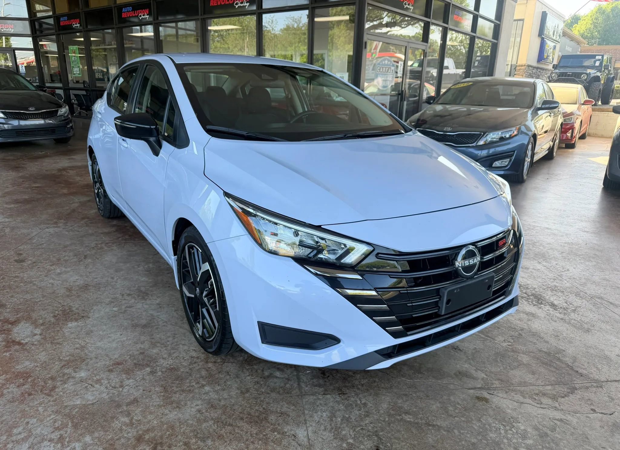 Used 2024 Nissan Versa SR w/ Trunk Package FWD image 1