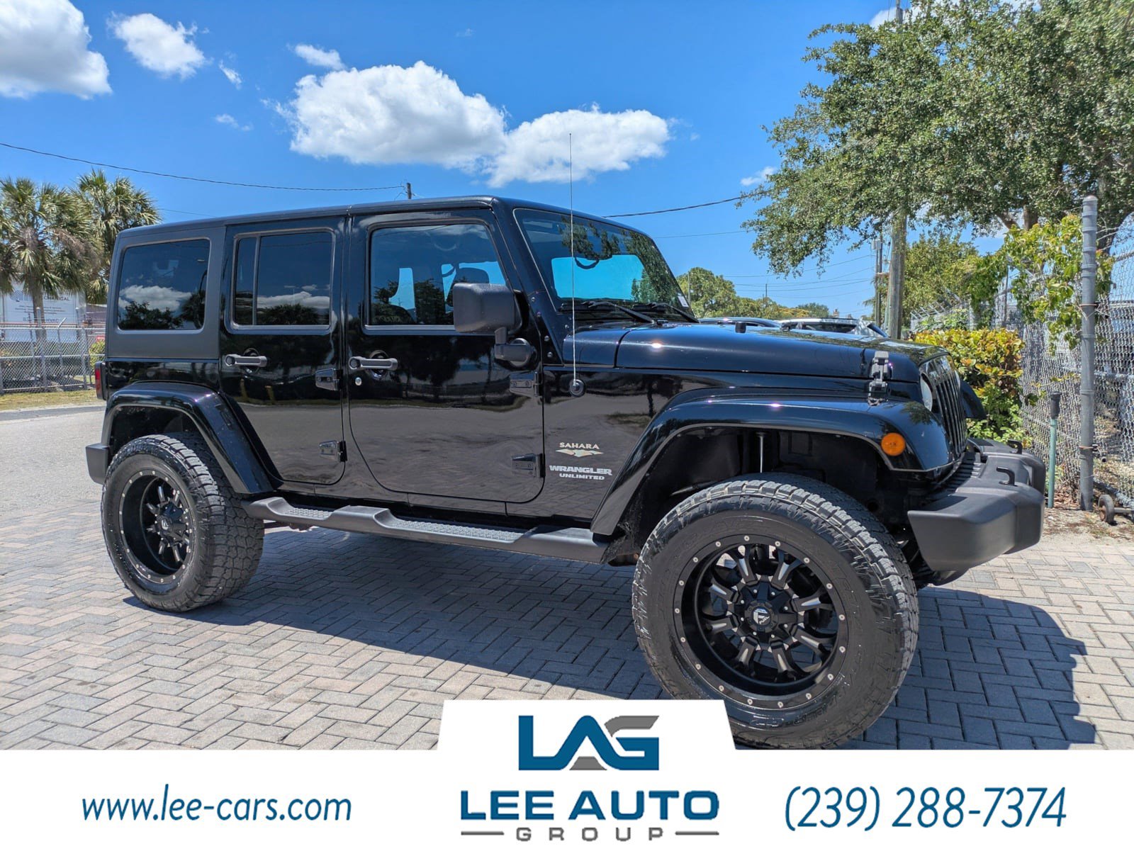 Used 2014 Jeep Wrangler Unlimited Sahara w/ Dual Top Group AWD/4WD image 1