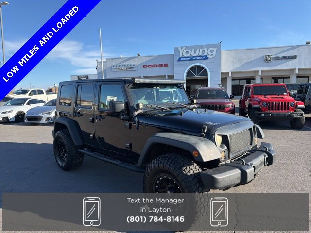 Used 2010 Jeep Wrangler Unlimited Sport image 1