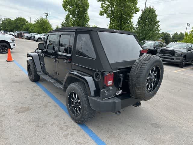 Used 2012 Jeep Wrangler Unlimited Sahara w/ Dual Top Group AWD/4WD image 12