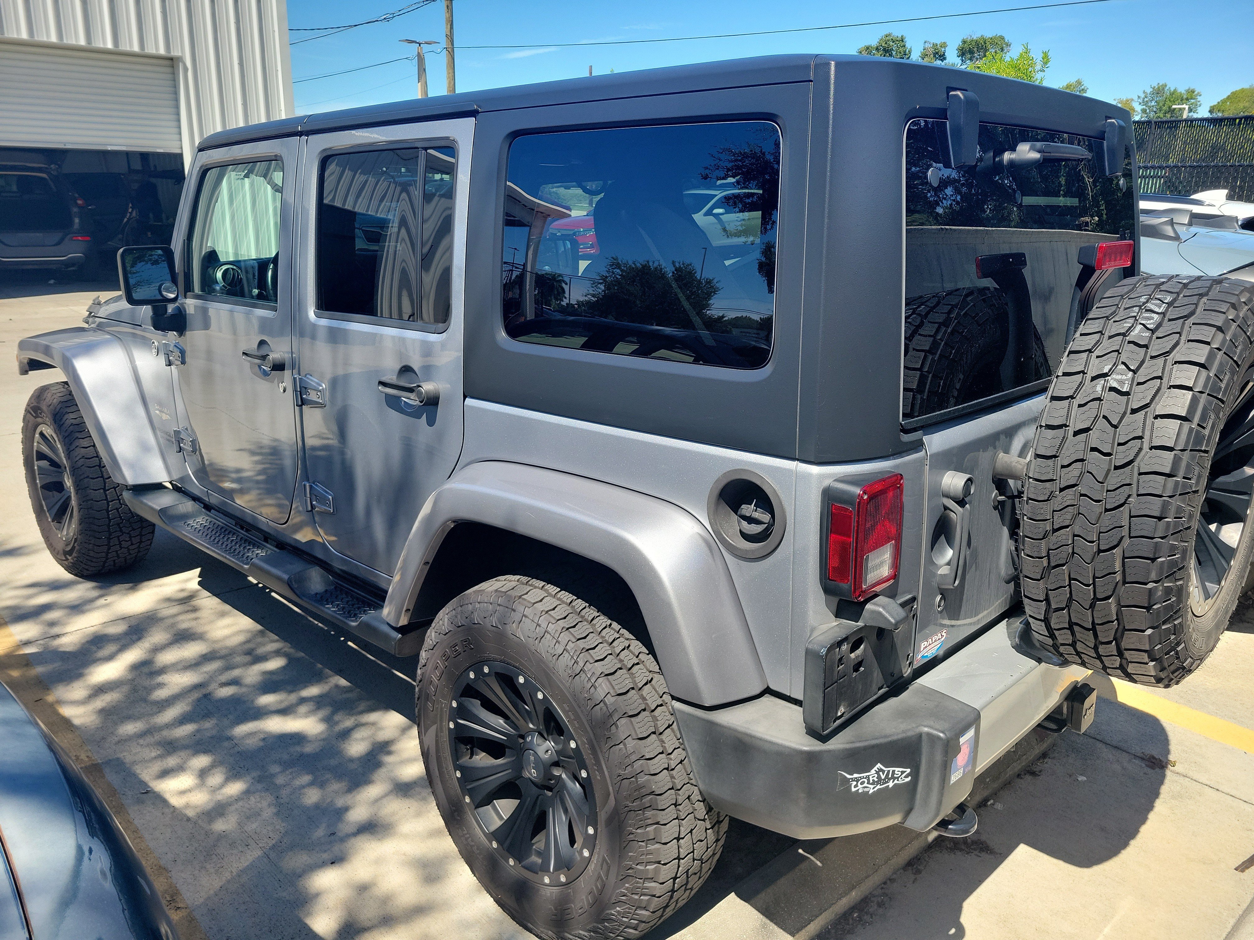Used 2014 Jeep Wrangler Unlimited Sahara w/ Dual Top Group AWD/4WD image 7