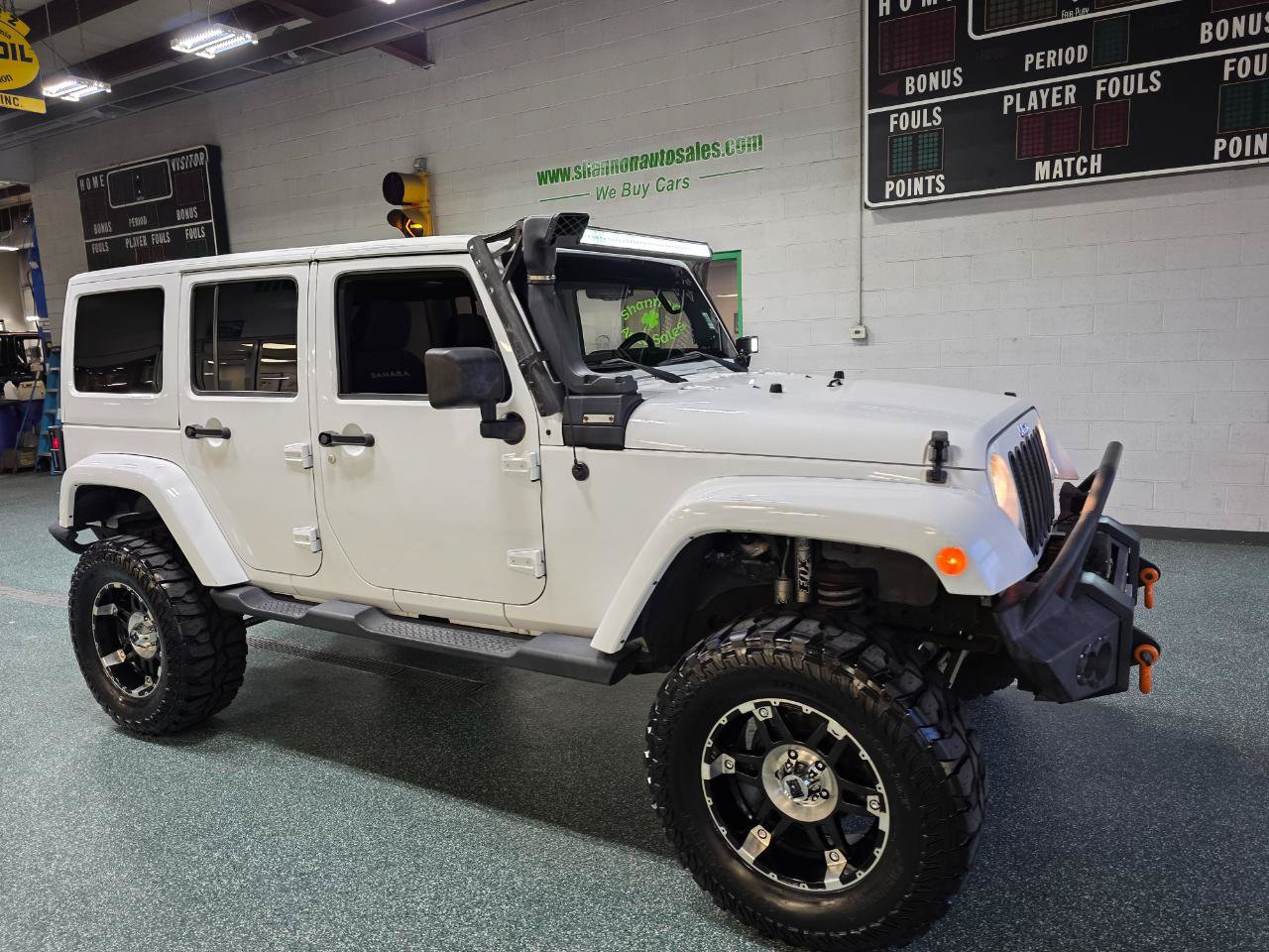 Used 2013 Jeep Wrangler Unlimited Sahara w/ Dual Top Group AWD/4WD image 4