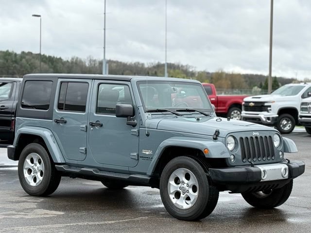Used 2015 Jeep Wrangler Unlimited Sahara w/ Dual Top Group AWD/4WD image 32