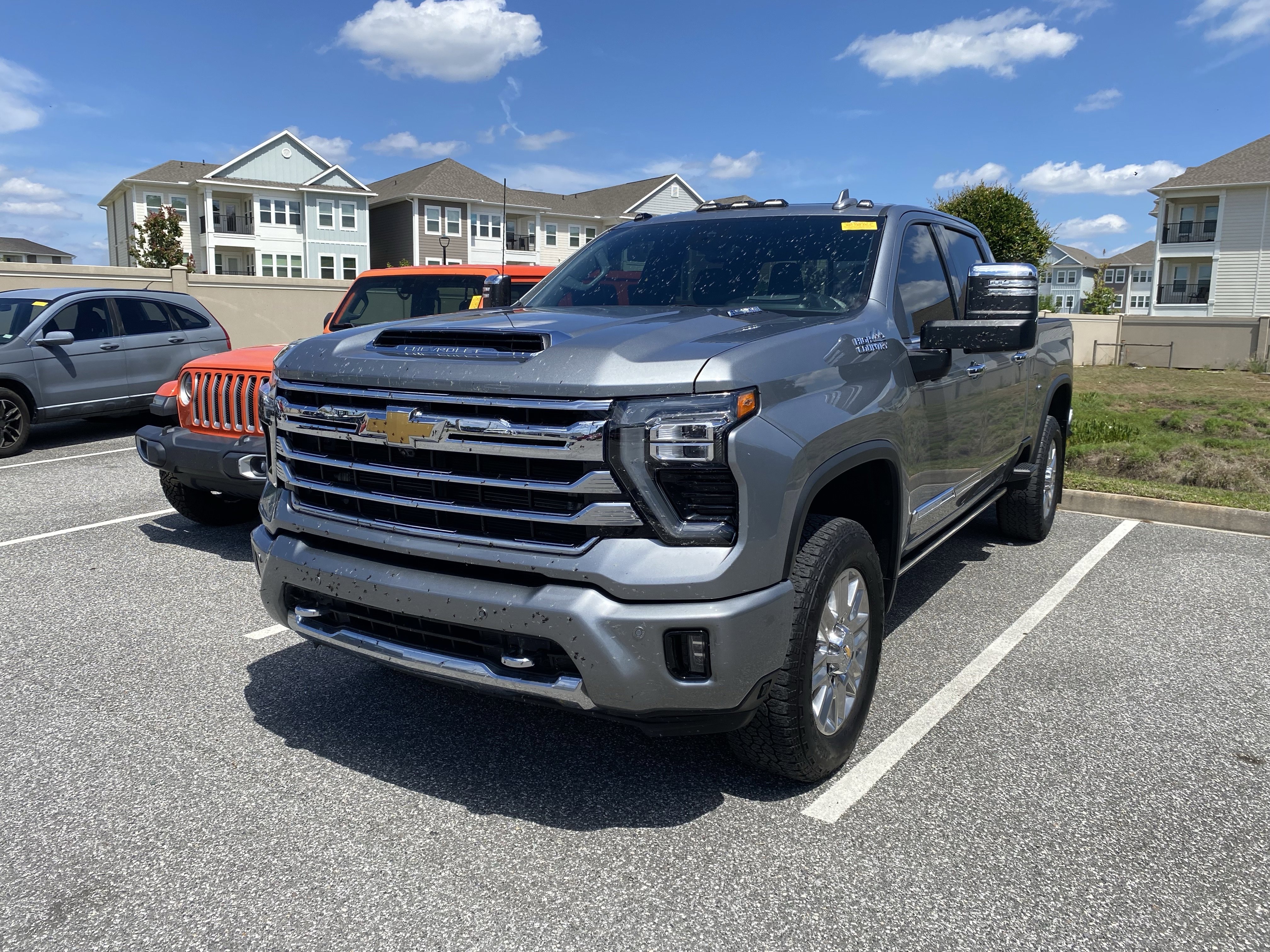 Used 2024 Chevrolet Silverado 2500 High Country w/ High Country Premium Package AWD/4WD image 1
