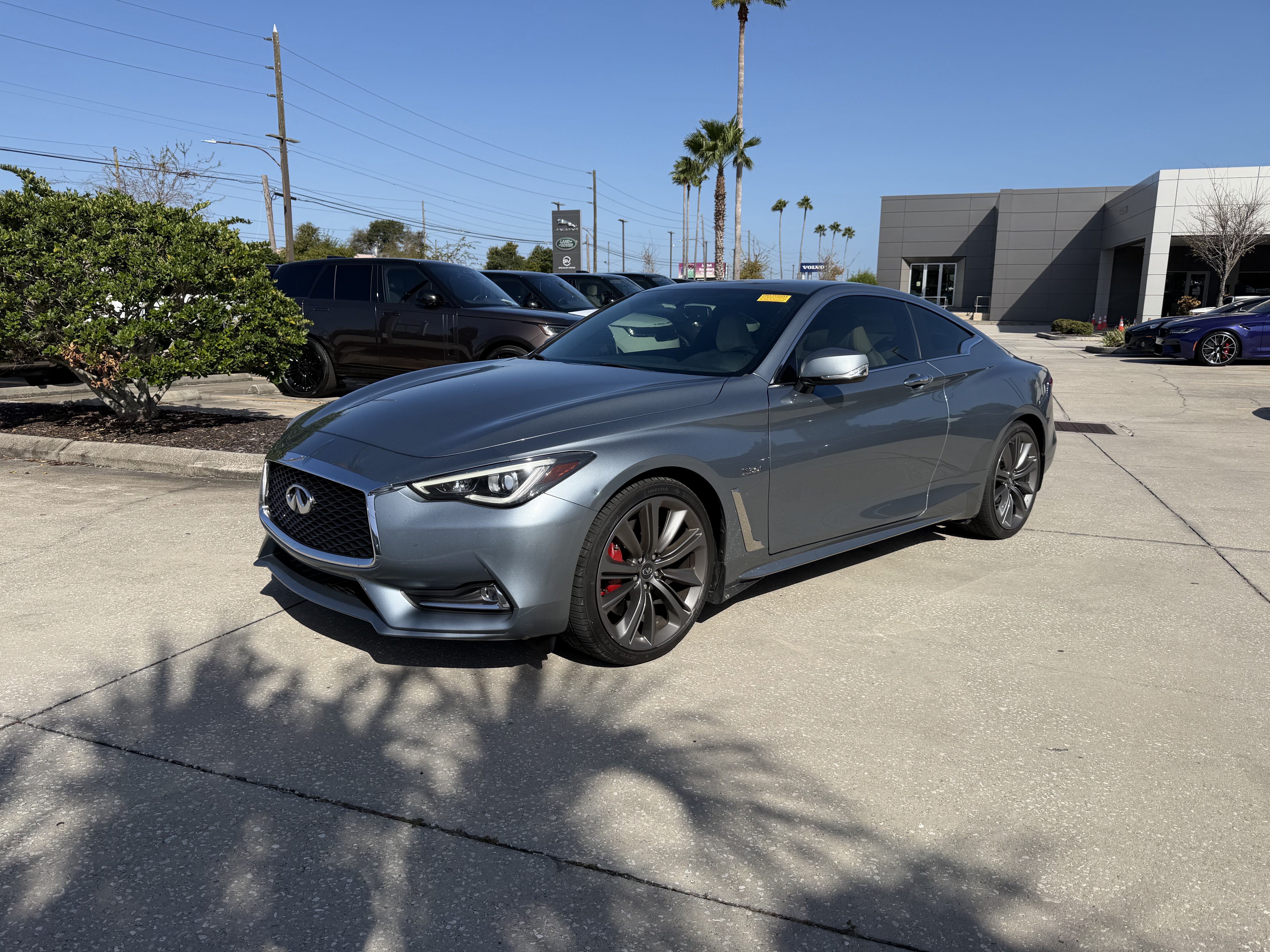 Used 2018 INFINITI Q60 Red Sport 400 w/ Sensory Package 3.0T Sport AWD/4WD image 1