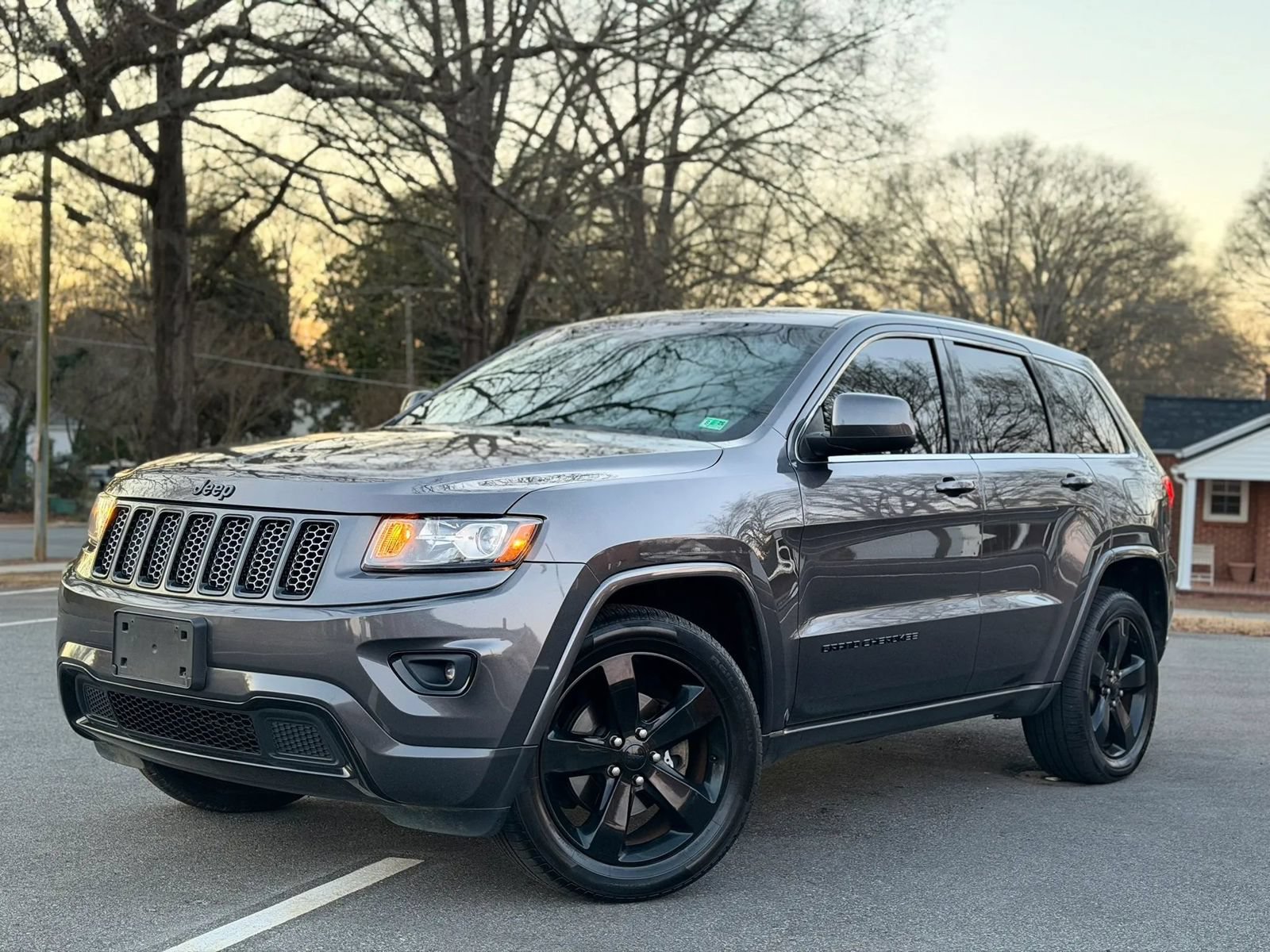 Used 2015 Jeep Grand Cherokee Altitude AWD/4WD image 2