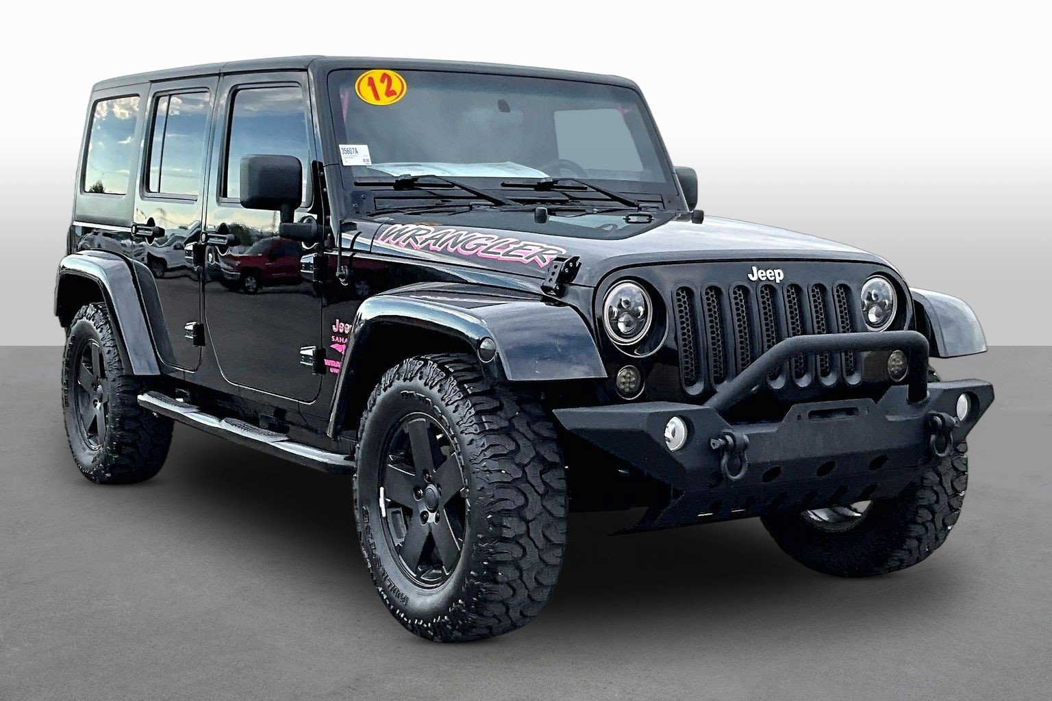 Used 2012 Jeep Wrangler Unlimited Sahara w/ Dual Top Group AWD/4WD image 10