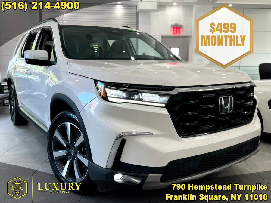 Used 2025 Honda Pilot Touring image 1