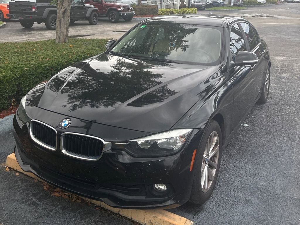 Used 2017 BMW 320i Sedan RWD image 1
