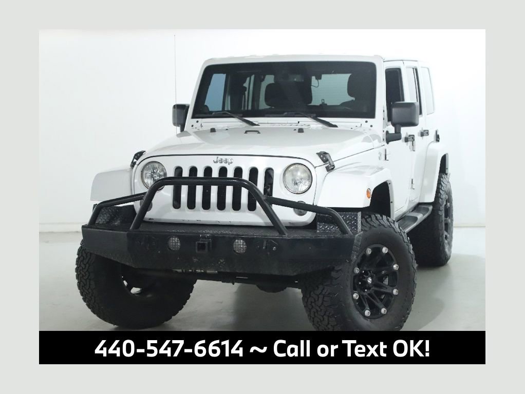Used 2014 Jeep Wrangler Unlimited Sahara image 1