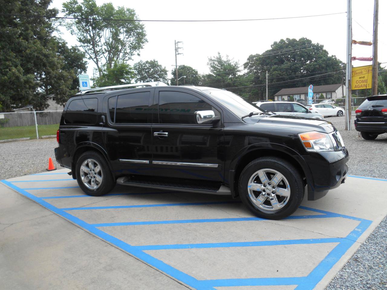 Used 2011 Nissan Armada Platinum w/ 2nd Row Captain Seat Pkg AWD/4WD image 23