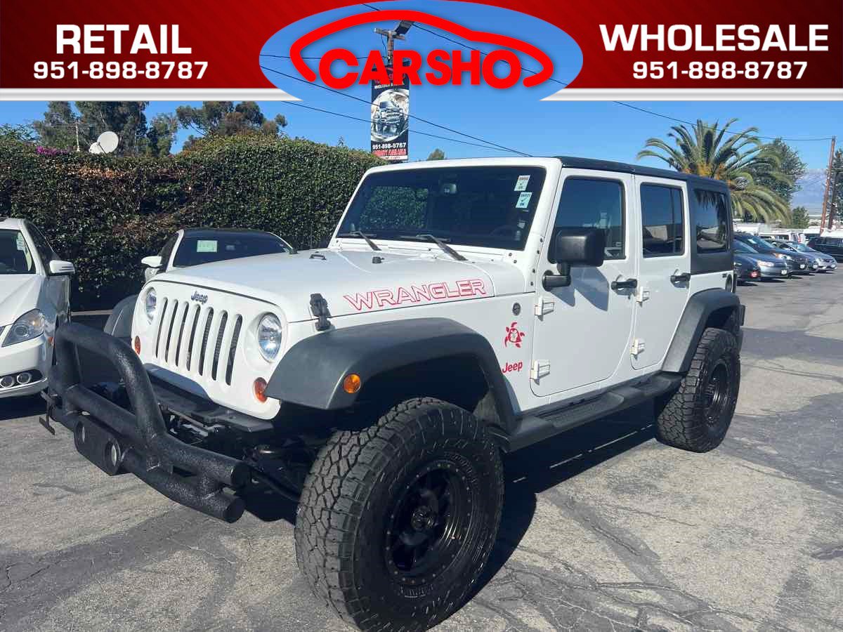 Used 2013 Jeep Wrangler Unlimited Sport image 1