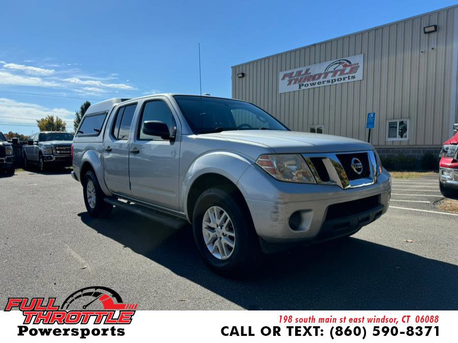 Used 2014 Nissan Frontier SV image 1