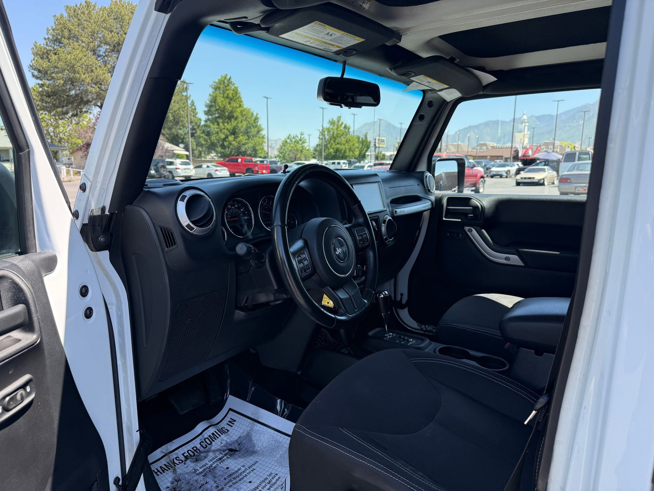 Used 2015 Jeep Wrangler Unlimited Sahara w/ Connectivity Group AWD/4WD image 11