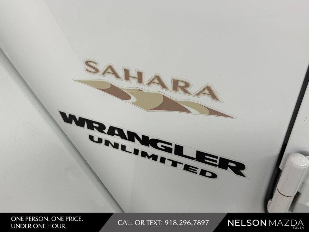 Used 2014 Jeep Wrangler Unlimited Sahara w/ Mopar Chrome Edition Group AWD/4WD image 16