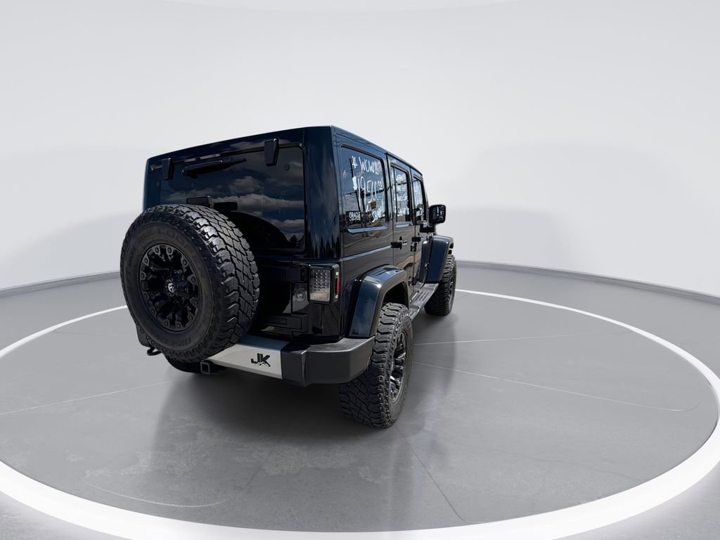 Used 2014 Jeep Wrangler Unlimited Sahara w/ Dual Top Group AWD/4WD image 8
