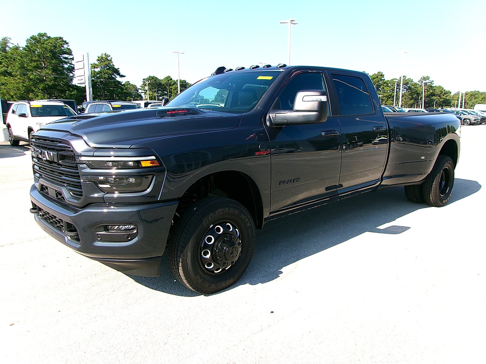 New 2026 RAM 3500 Laramie w/ Night Edition AWD/4WD image 1